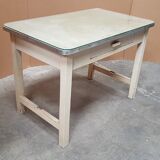 Old desk table with glass plate and drawer