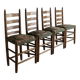 Rustic ladder-back oak chairs with embroidered seats | Netherlands | 1950s