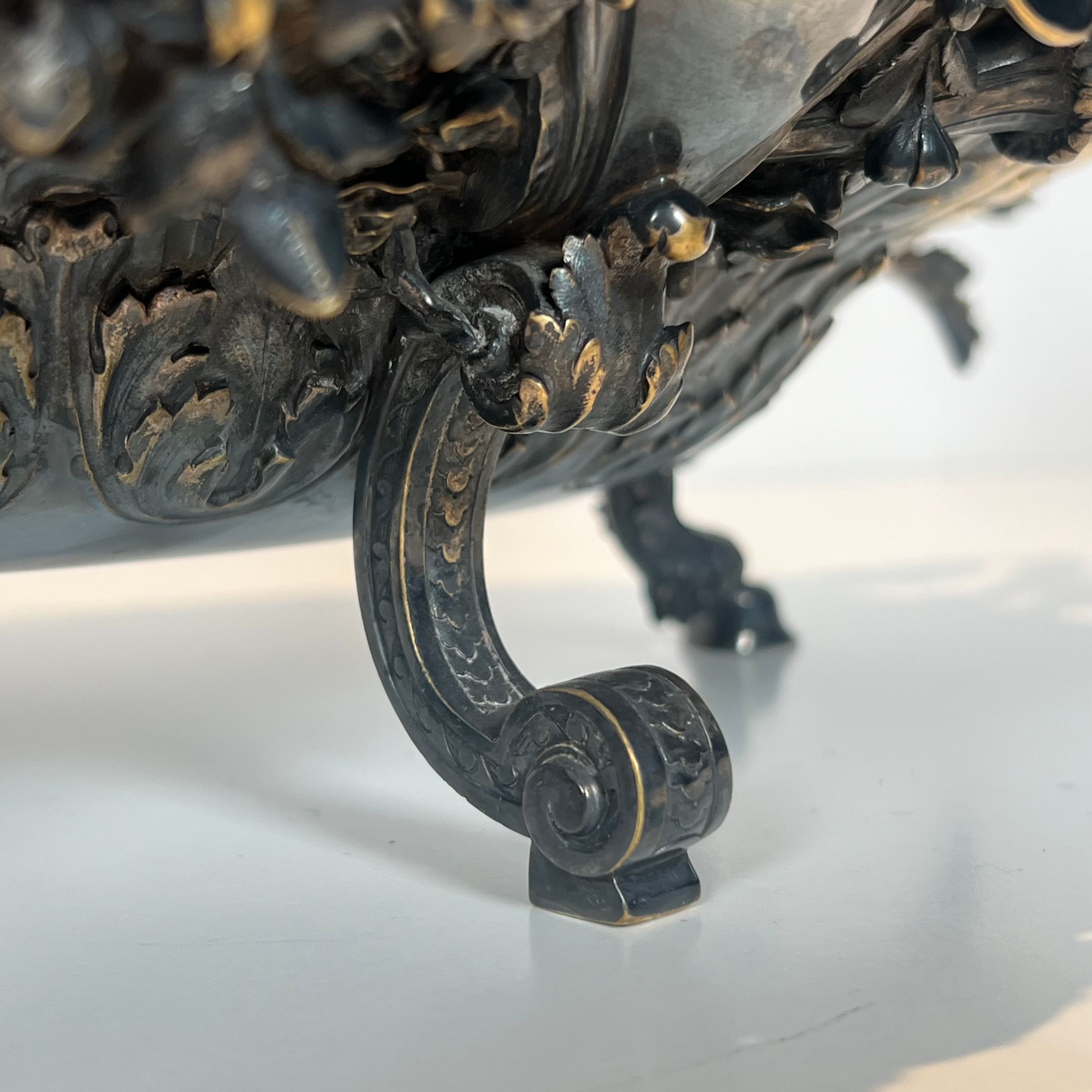 Especially a silver-plated metal table with engraving, signed.