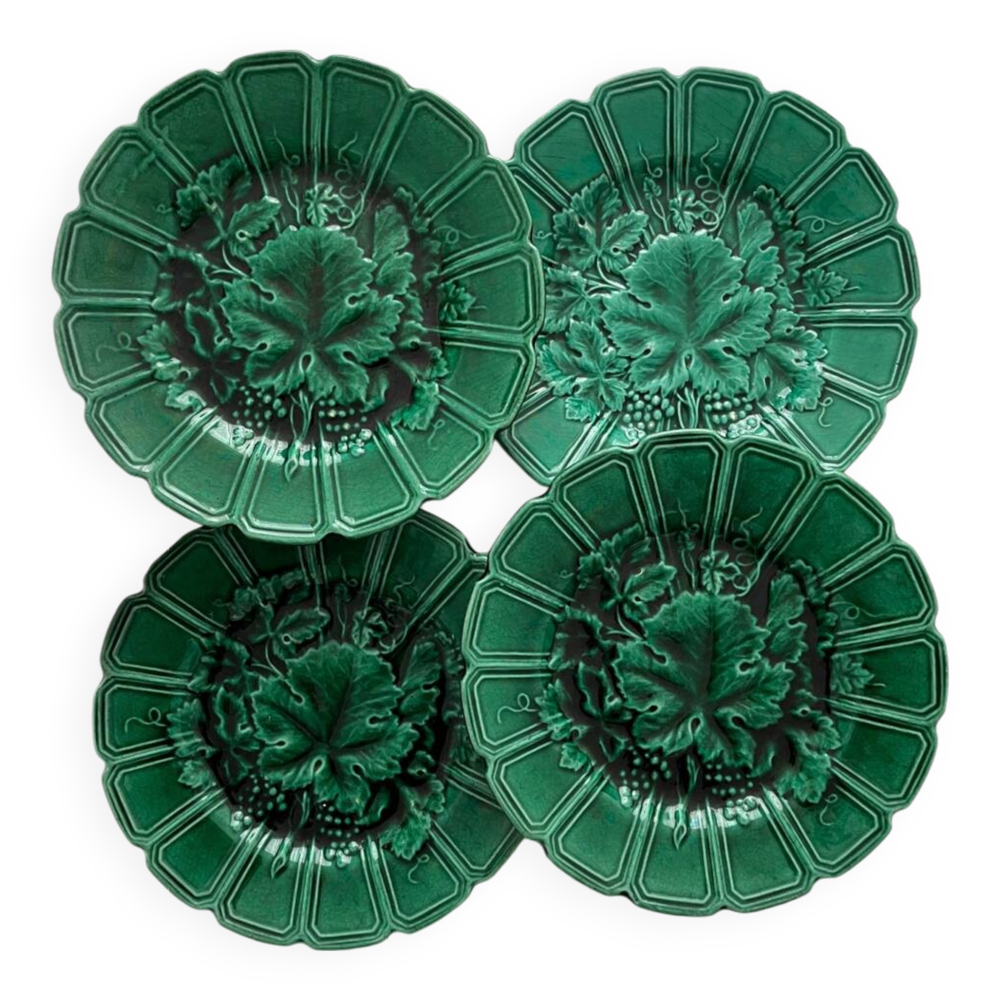 4 old plates in Sarreguemines vine leaf slip