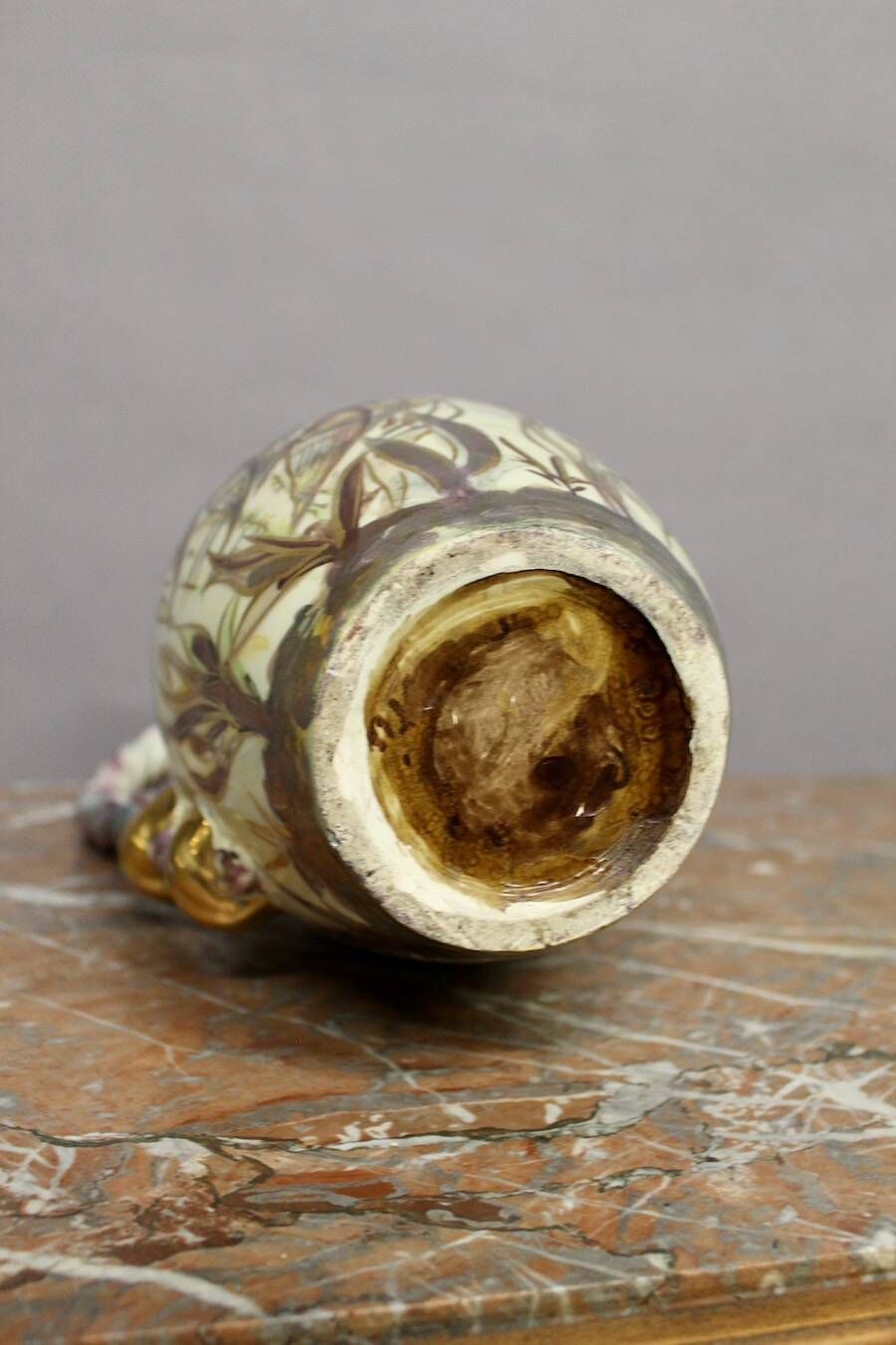 Ceramic jug with fish decoration