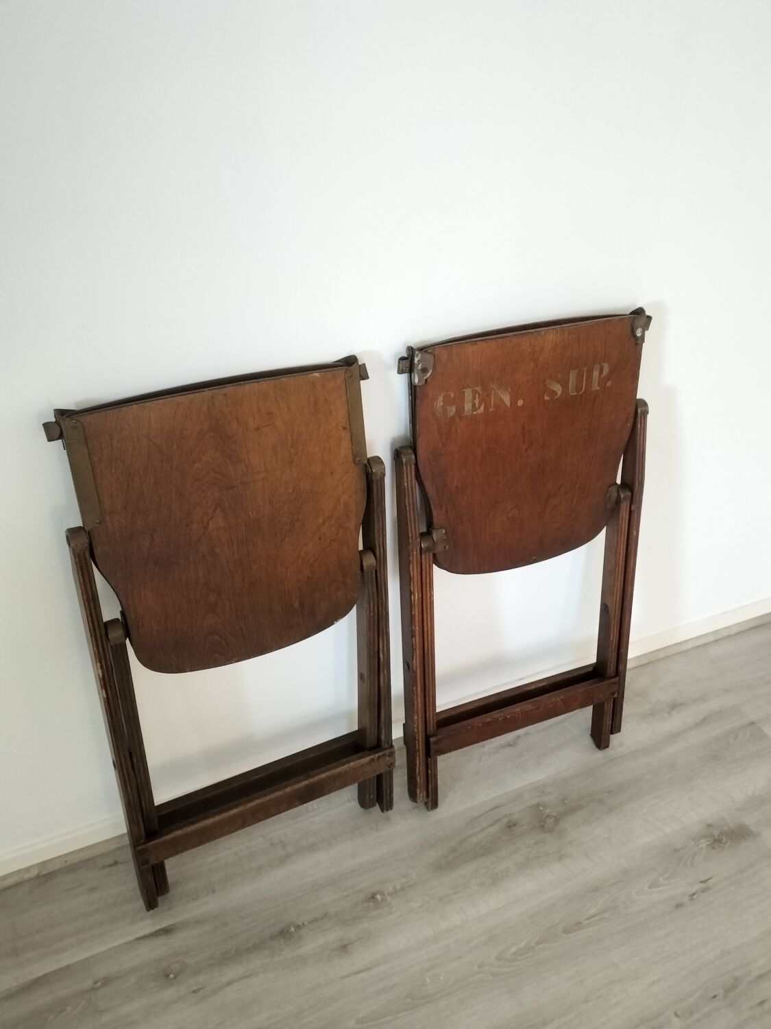 Folding chairs in US armed wood