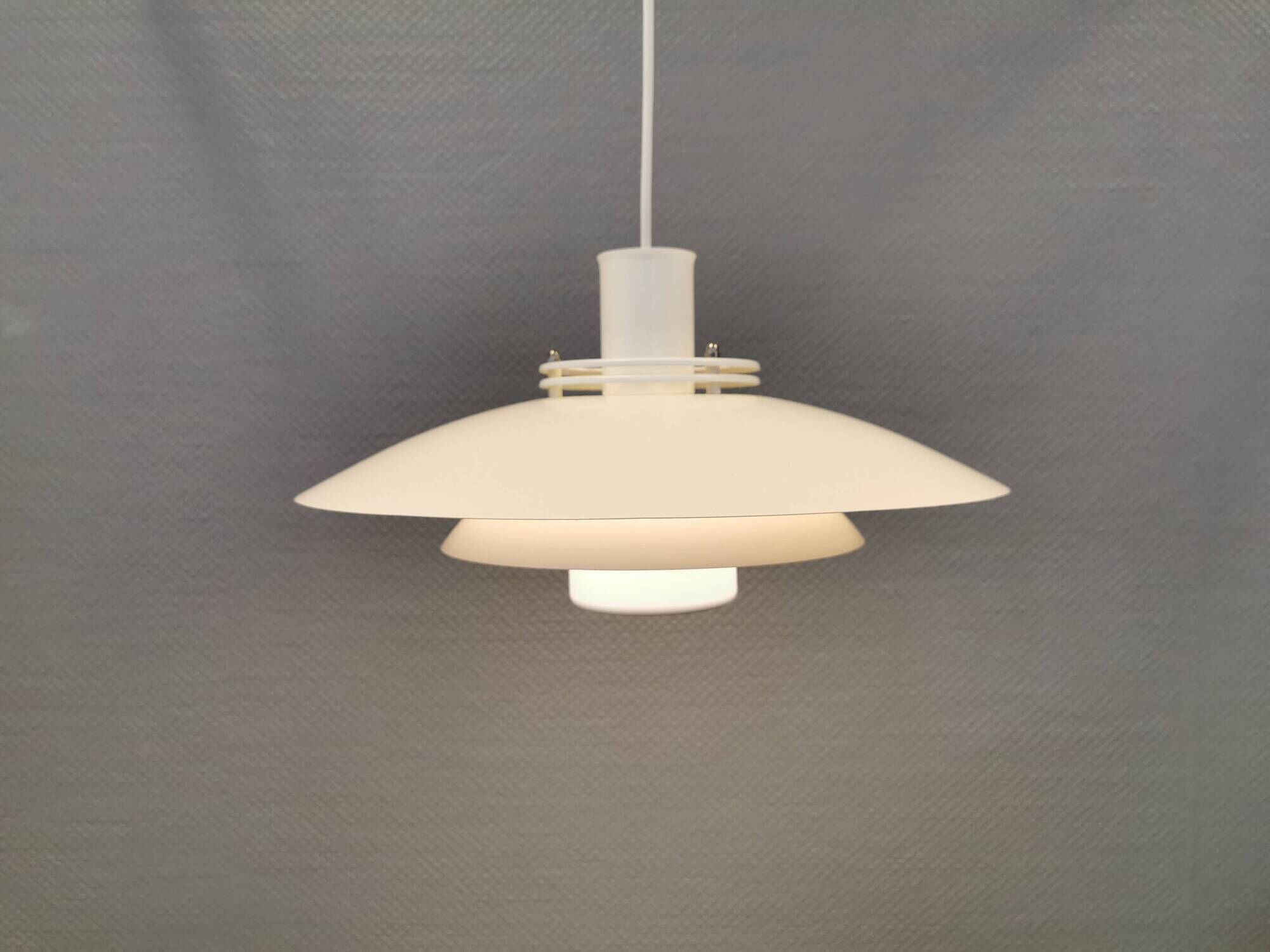 FormLight hanging lamp with multiple layers of shades, a Danish quality product from the 80s.