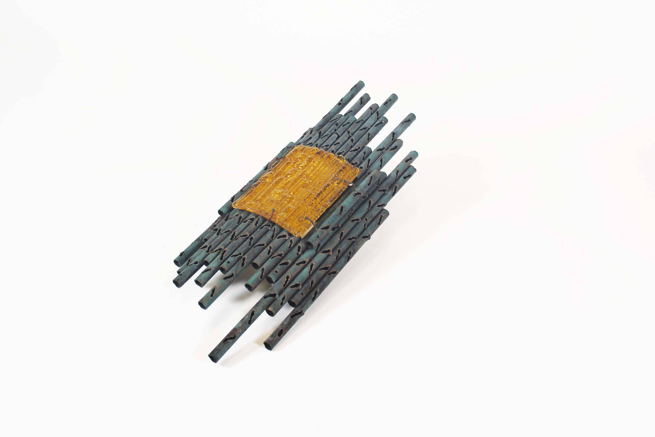 brutalist rough iron and glass wall sconce by Marcello Fantoni