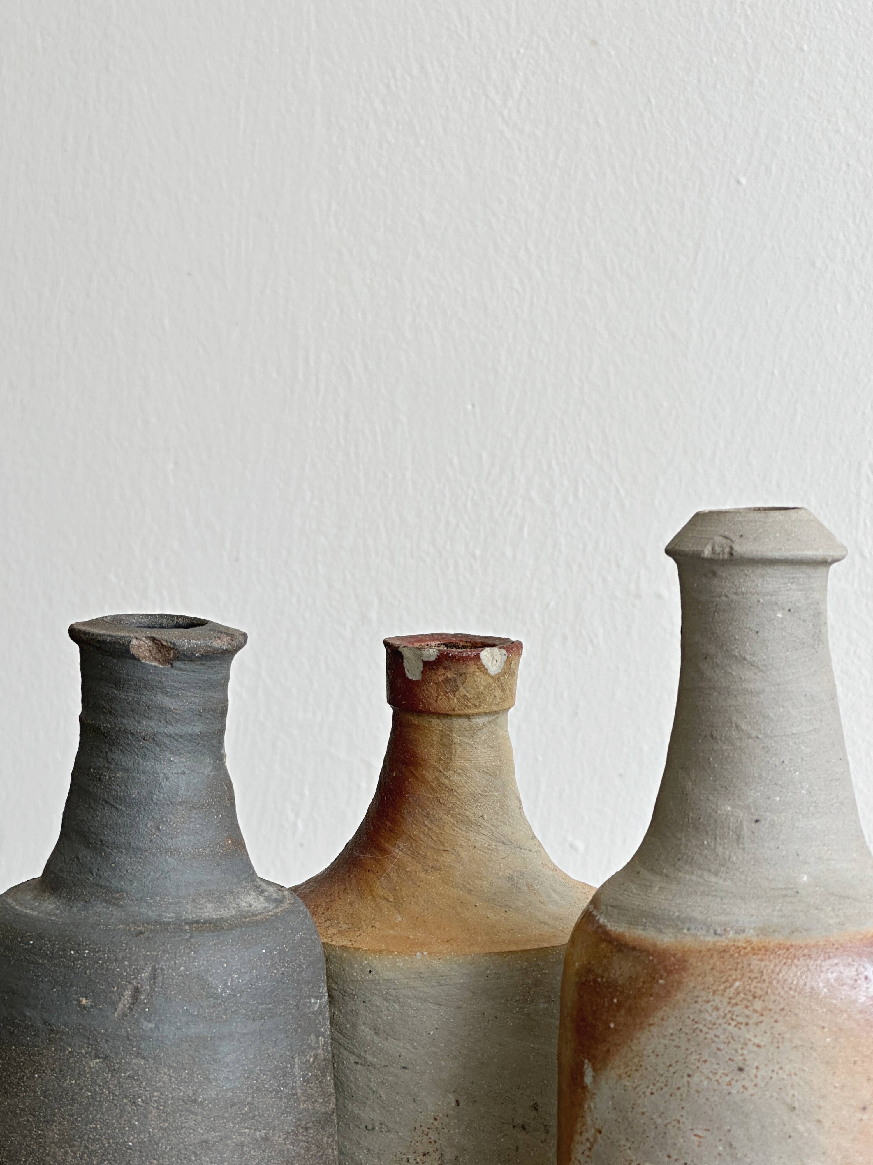 Lot de 3 bouteilles anciennes en grès
