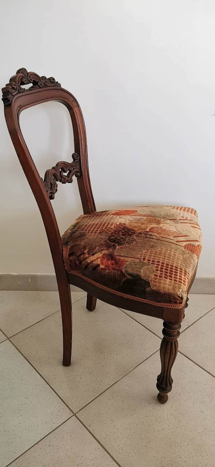 Carved wooden chair and velvet
