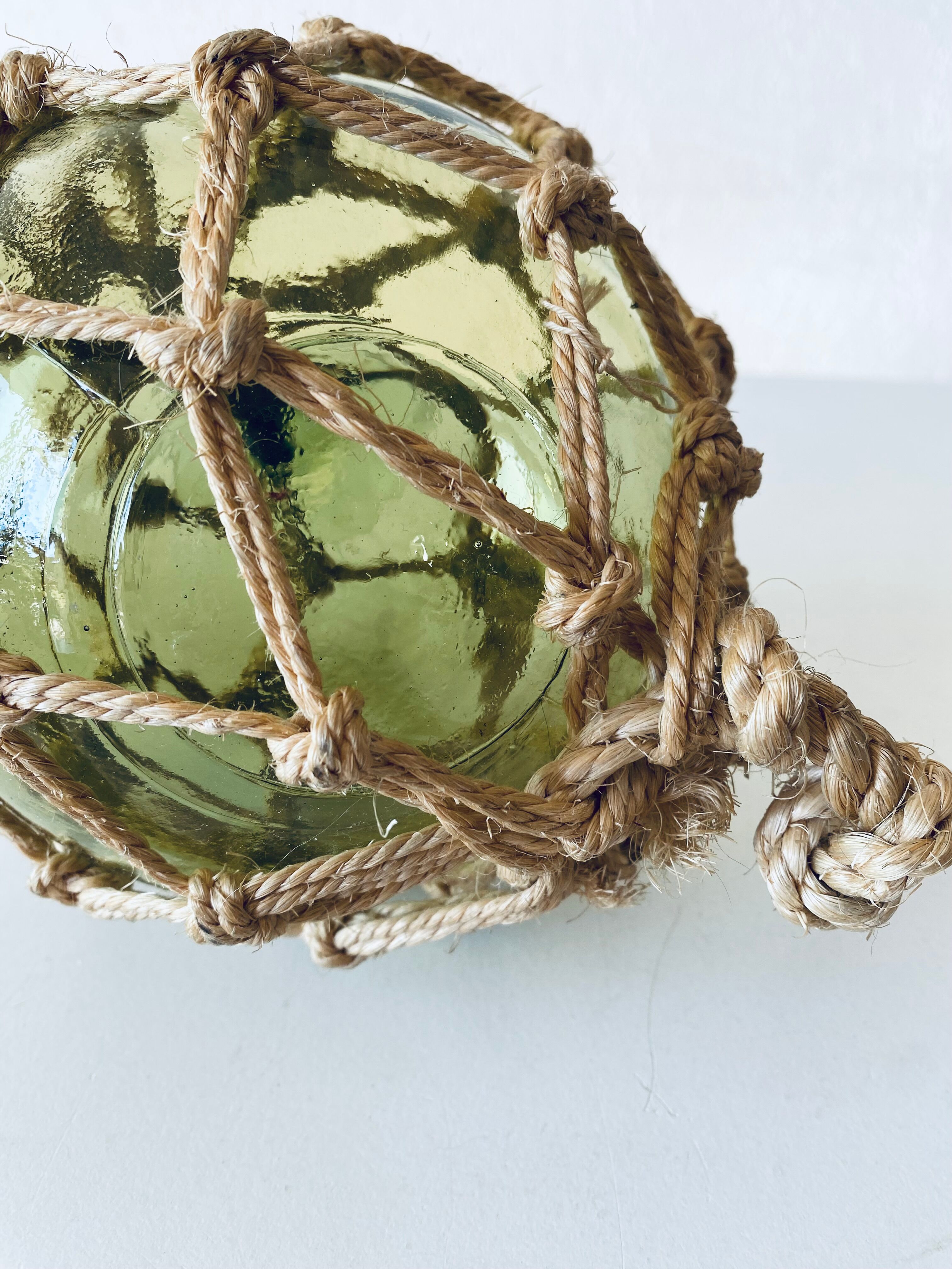 Antique fisherman's ball, old fishing floats