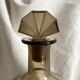 Art Deco smoked glass carafe with fan-shaped stopper.