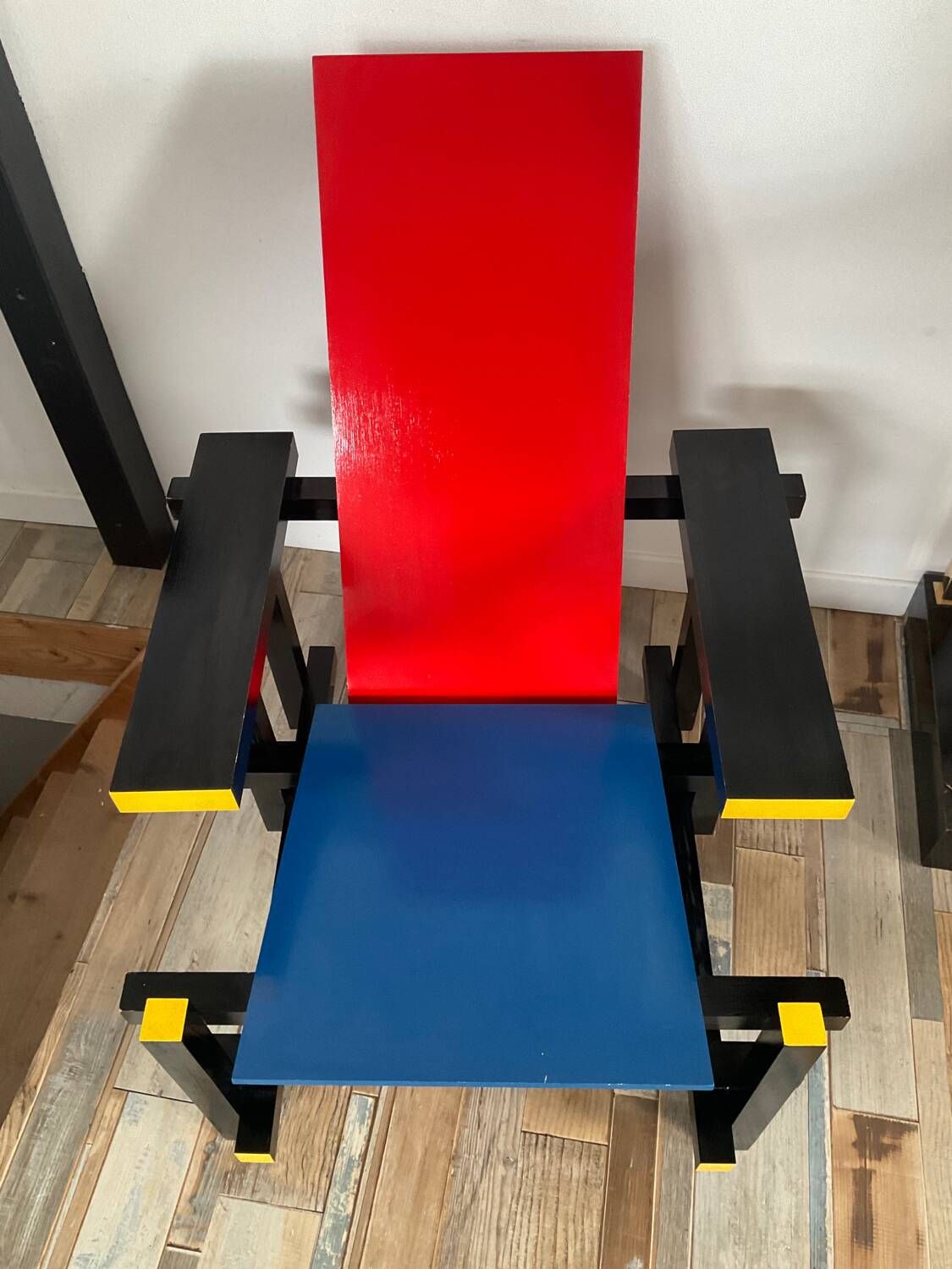 “Red and blue” lounge chair in the style of Gerrit Rietveld