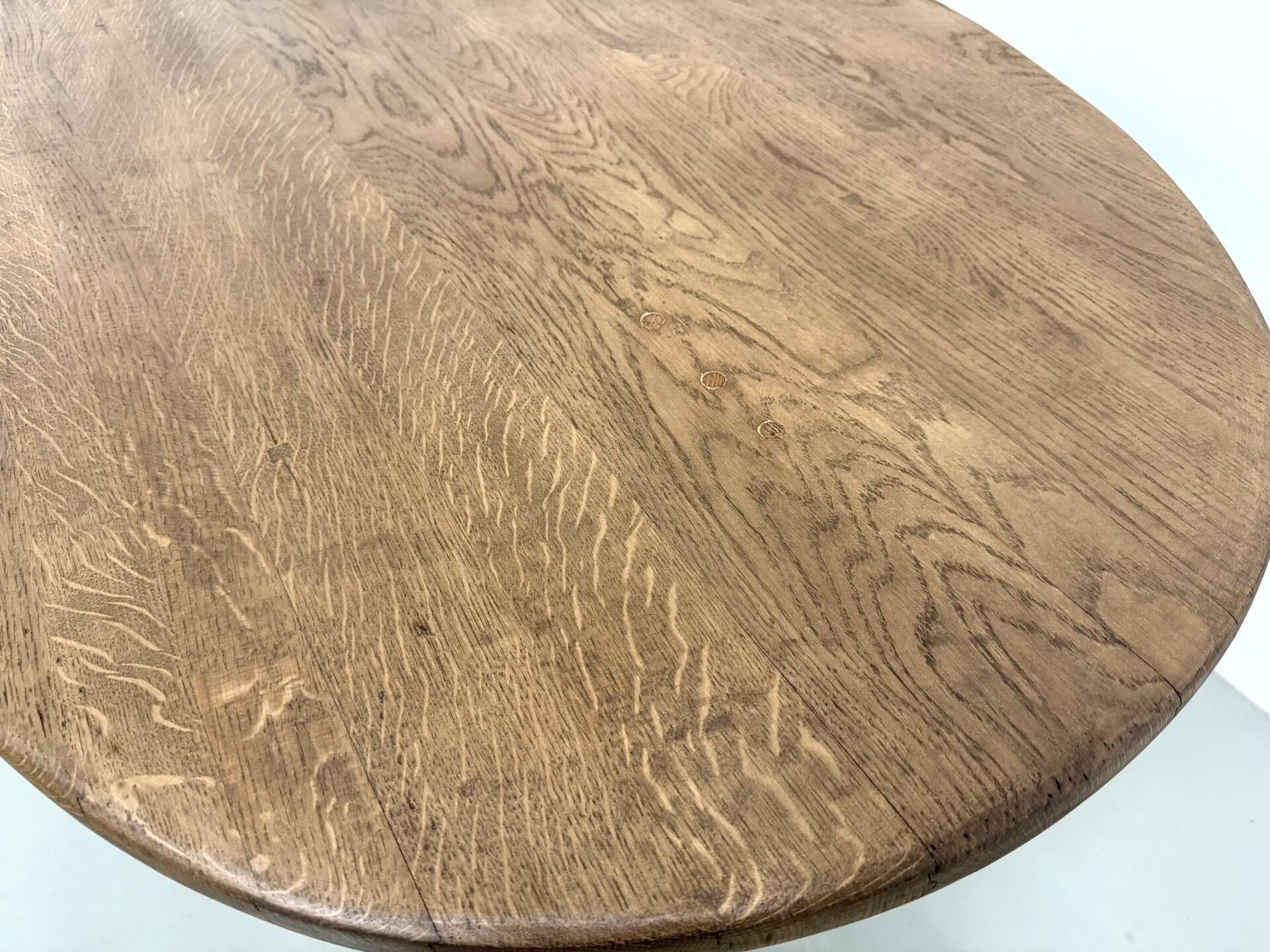 Oval table with T-shaped legs, solid oak, student woodworking project.