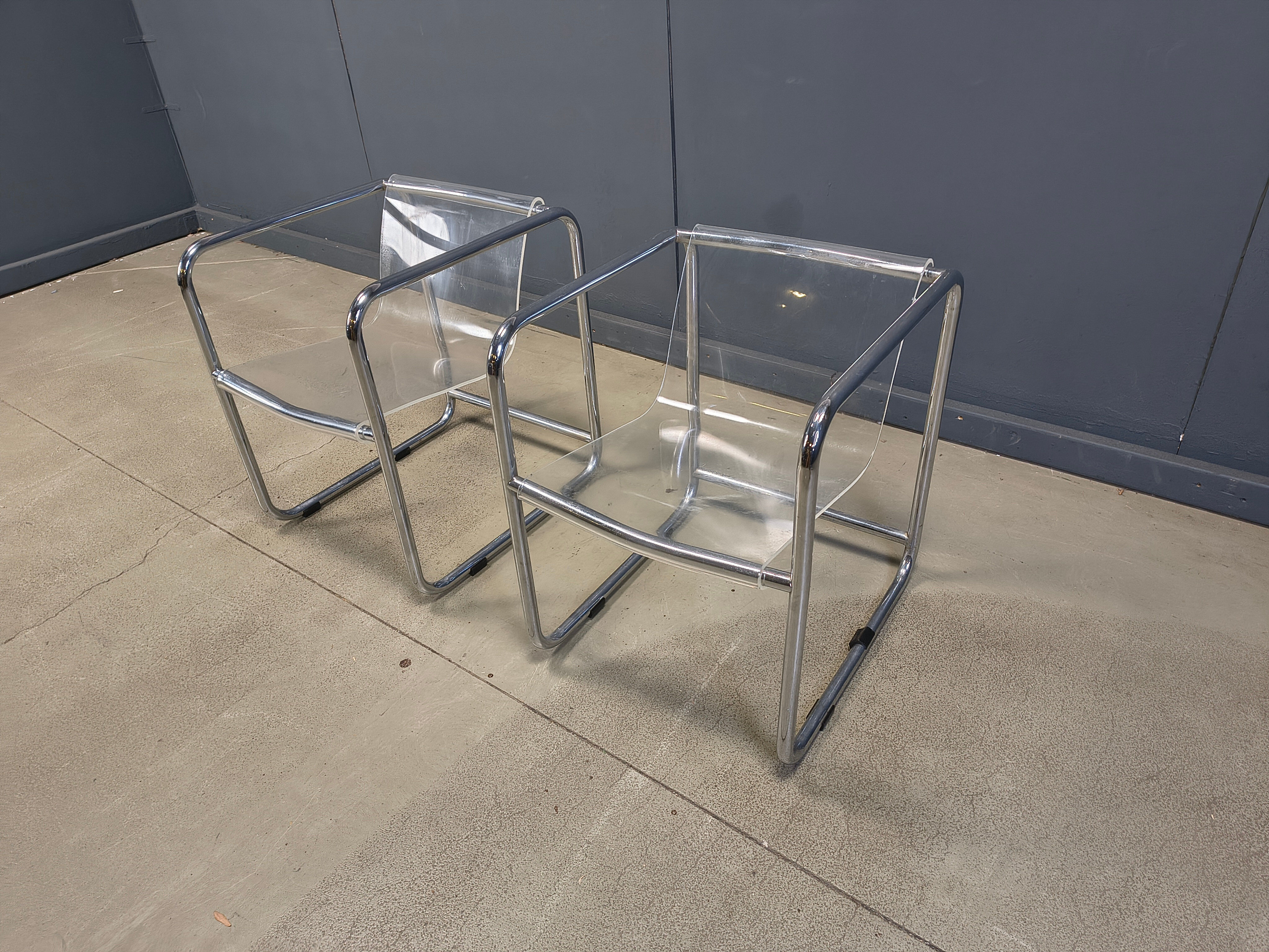 Pair of plexiglass and tubular chrome armchairs, 1970s