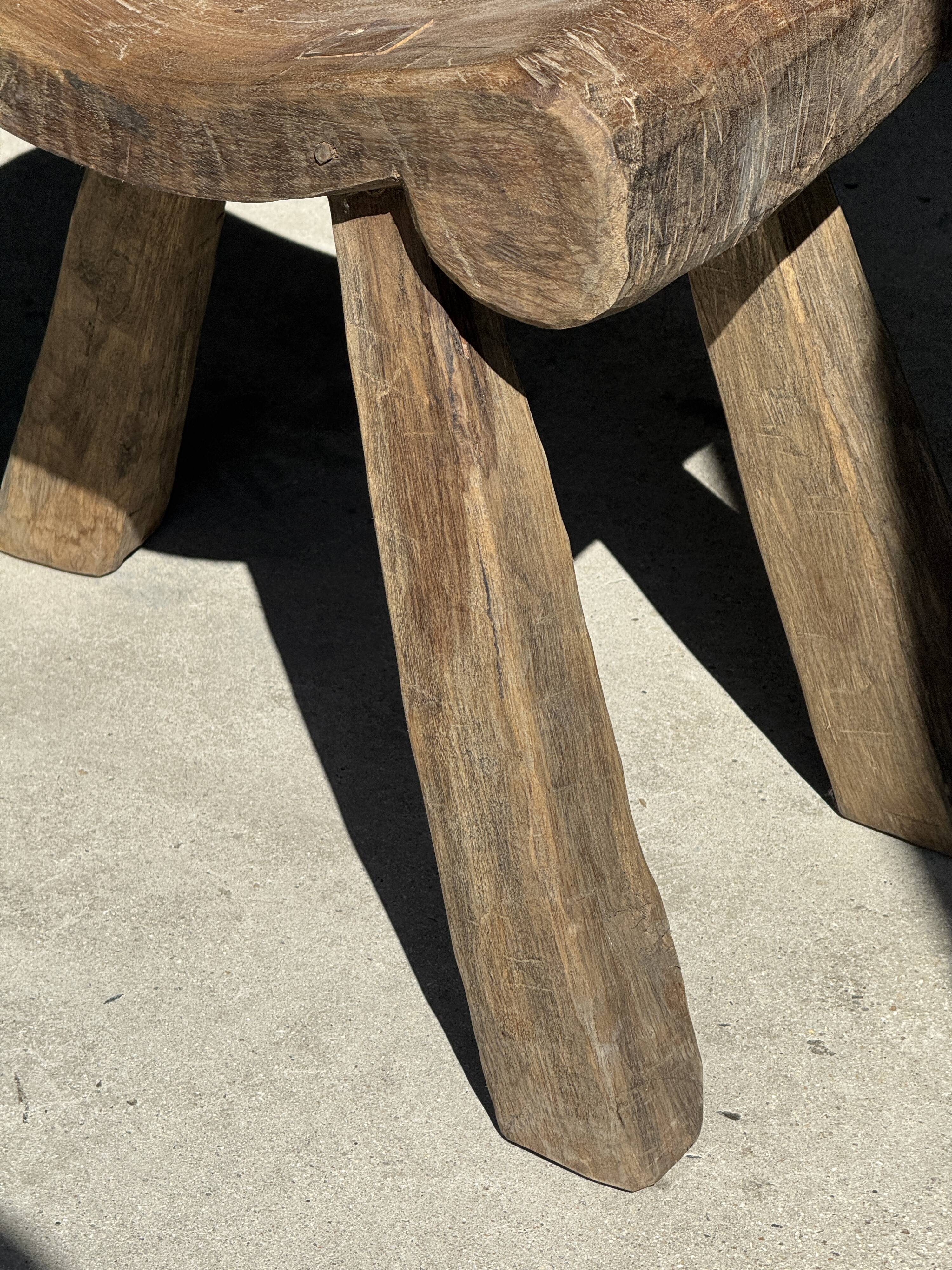 Four-legged stool in antique teak from Indonesia H 50 L 52