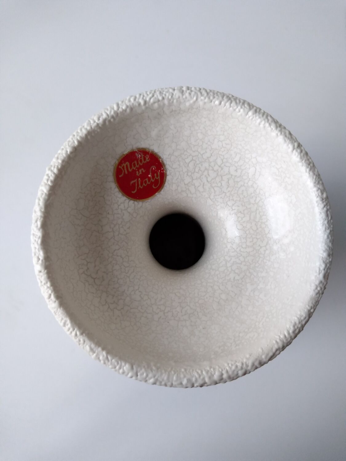 White and blue ceramic vase with italian relief