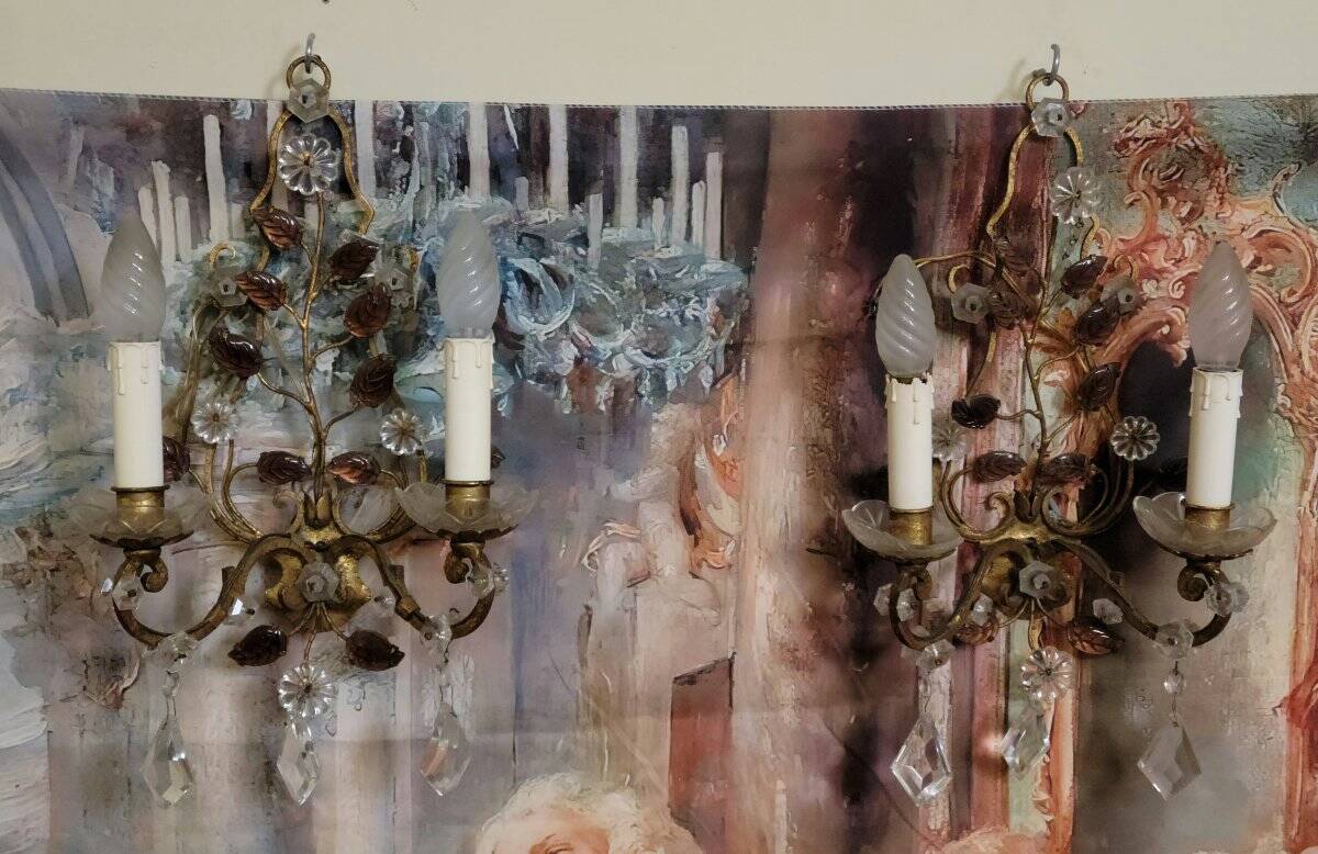 Murano: pair of wall sconces with two light arms, in bronze and gilded brass.