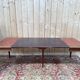 Table extensible style Louis XVI – Plateau cuir doré au petit fer – Bronze doré