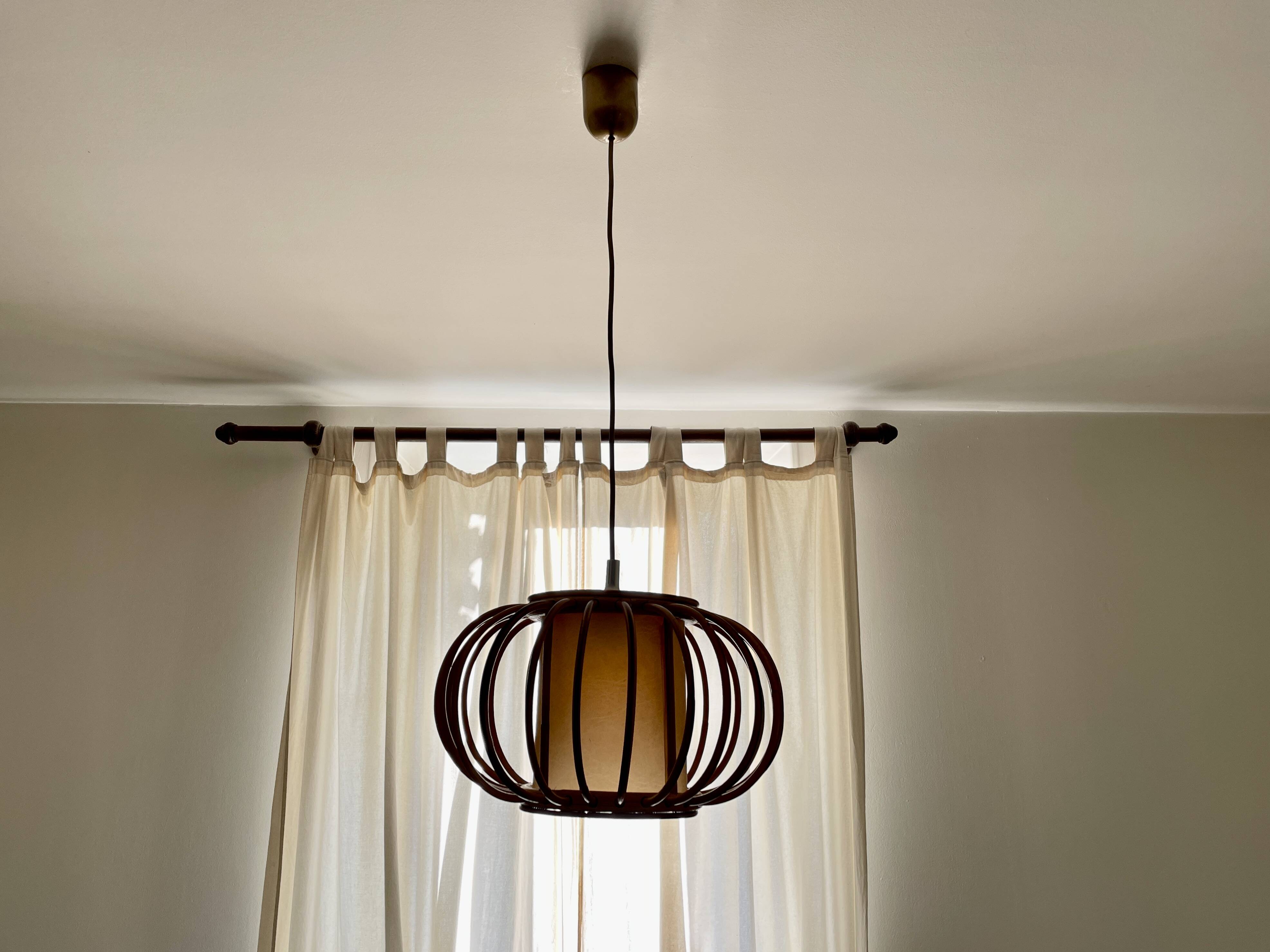 Curved wood pendant lamp 1960