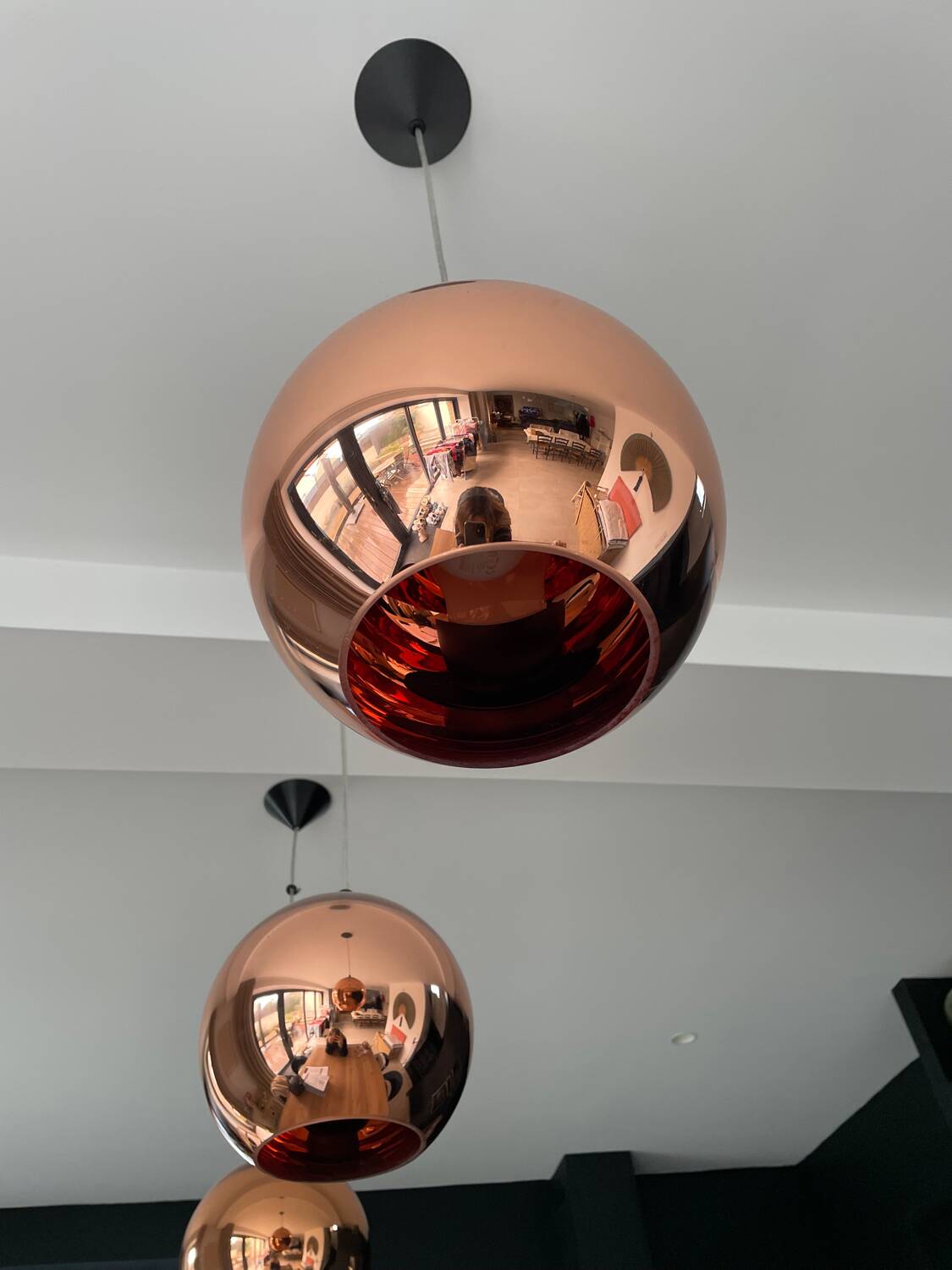 Copper Tom Dixon pendant lights individually