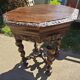 Large octagonal table in carved solid oak.