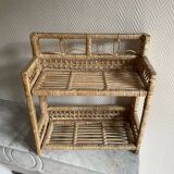 Small light beige wicker and rattan shelf