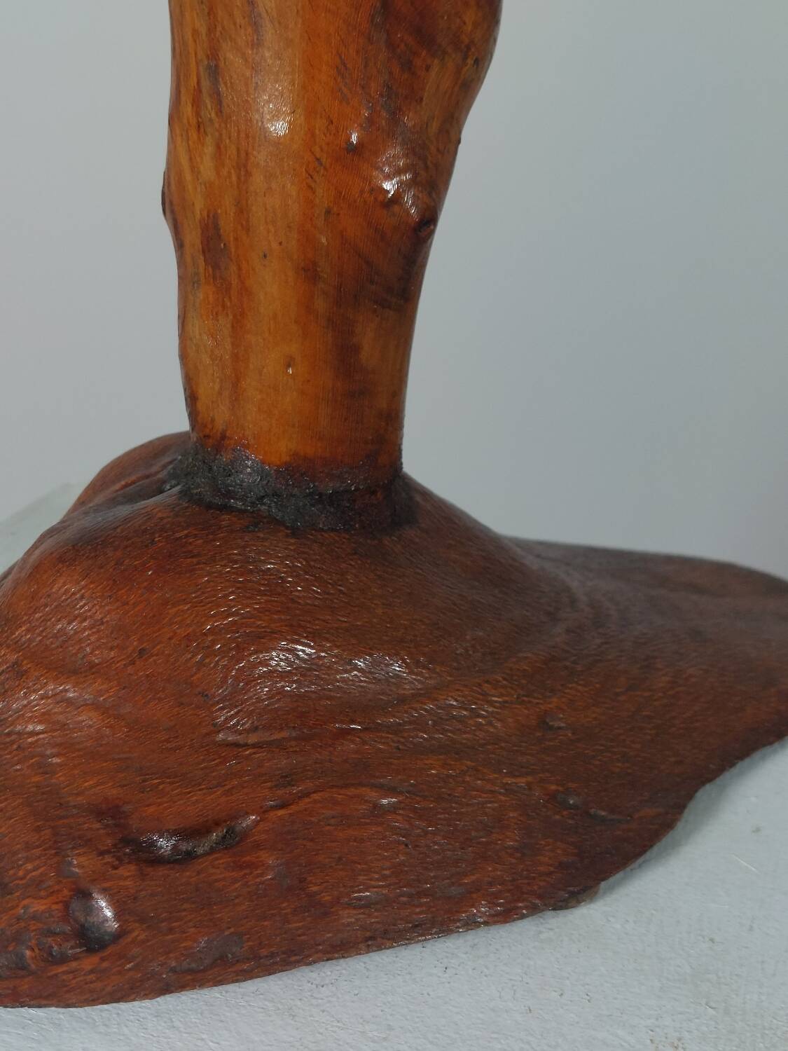 Vintage candle holder in an organic shape with a brass spike and tiered top.