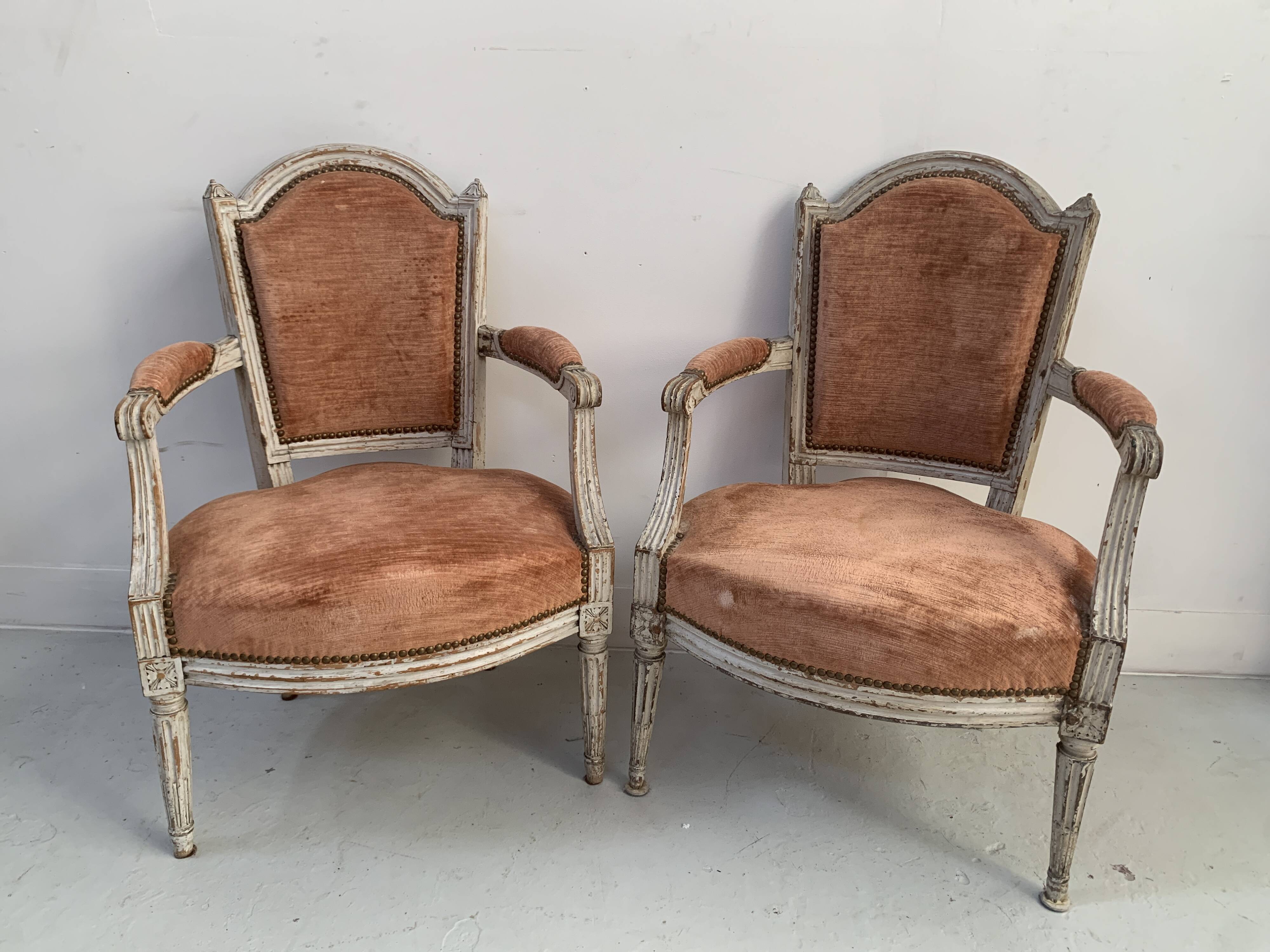 Pair of Louis XVI style armchairs in patinated beech, 19th century