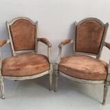 Paire de fauteuils de style Louis XVI en hetre patiné XIX siècle