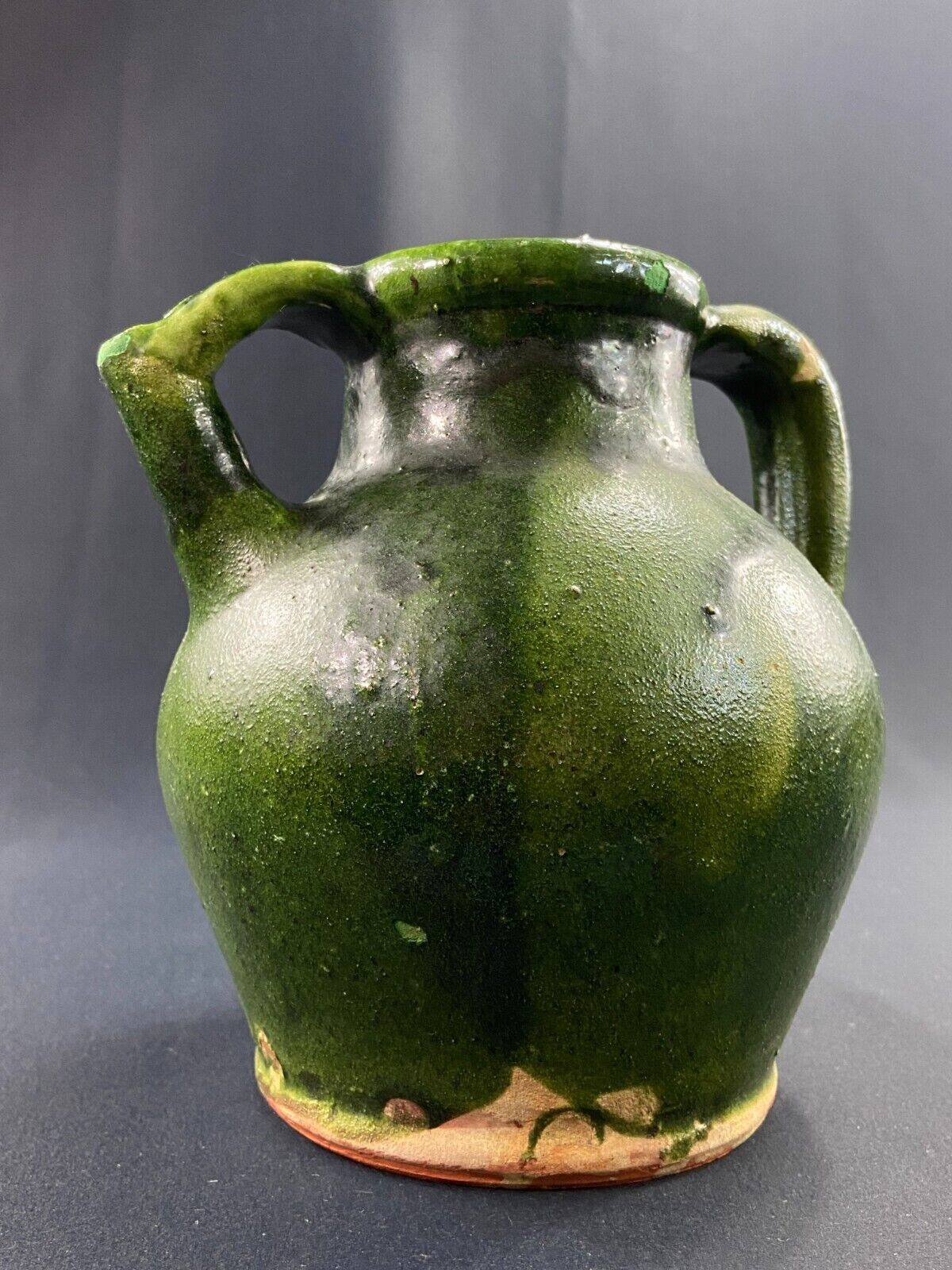 19th century green enamelled stoneware jug