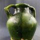 19th century green enamelled stoneware jug