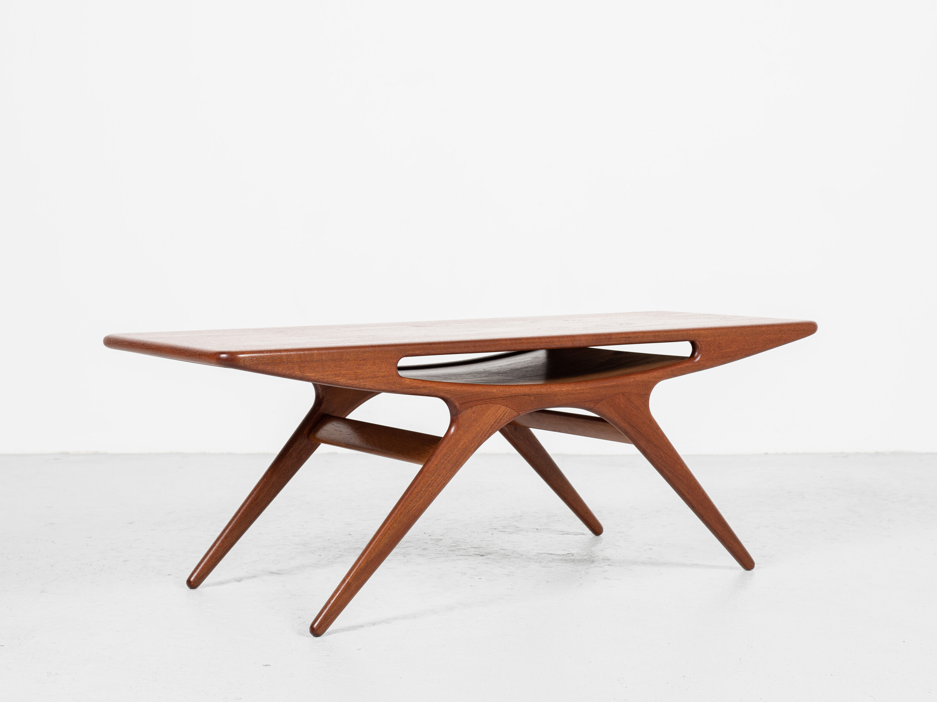 Midcentury danish smile coffee table in teak by johannes andersen for silkeborg 1950s