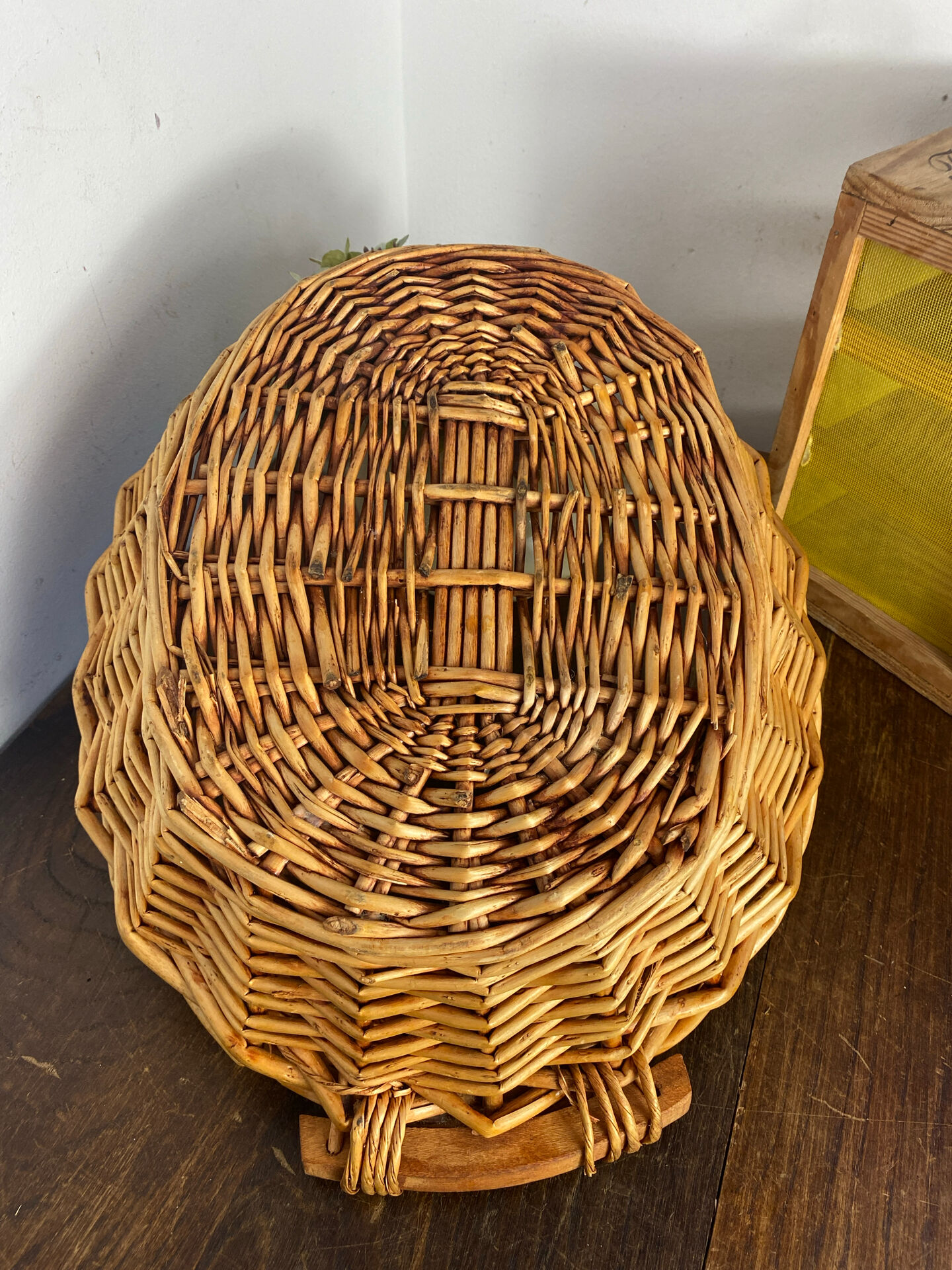 Wicker basket with wooden handles