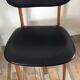 Scandinavian chair of the 60s in teak and black skaï