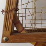 Vintage tennis racket with holding frame