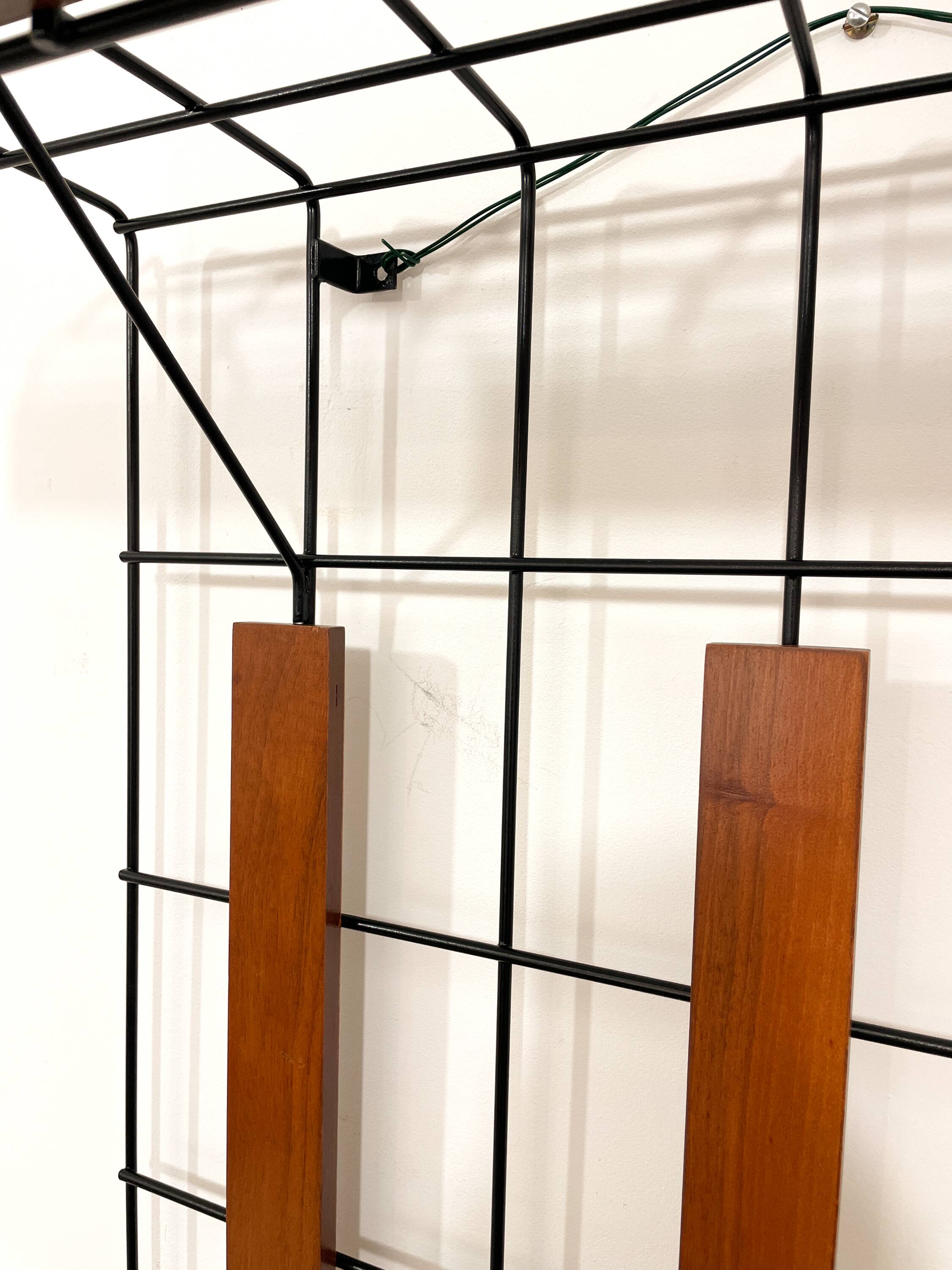 Metal and wood wall coat rack, 1950s-60s.