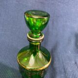 Green glass bottle and Louis style gilding