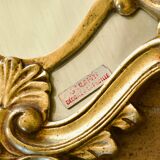 Antique Baroque mirror with gilded metal panels