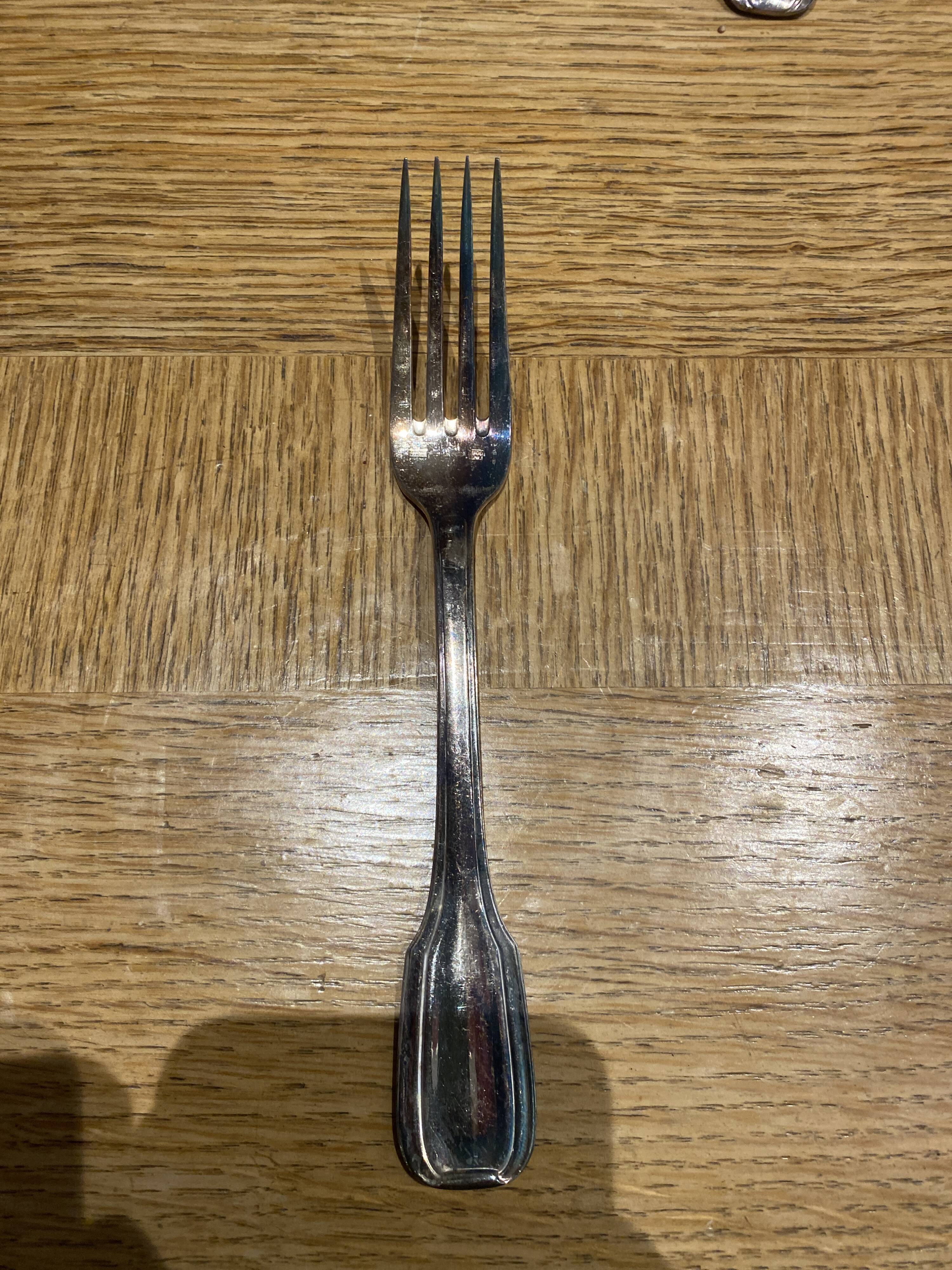 12 large silver metal forks