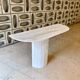 Travertine console with canted foot