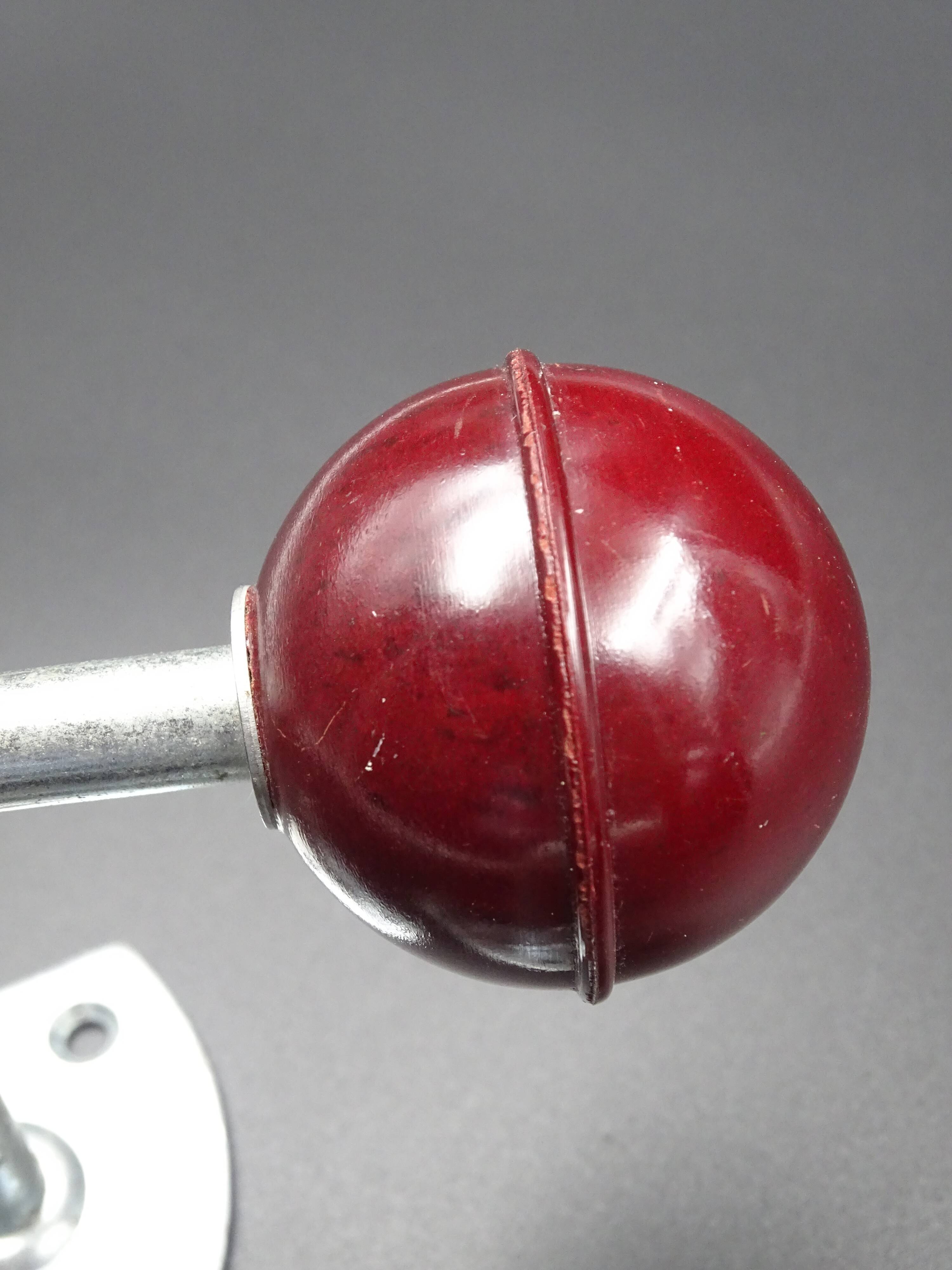 Two hooks in red bakelite and metal - around 1950