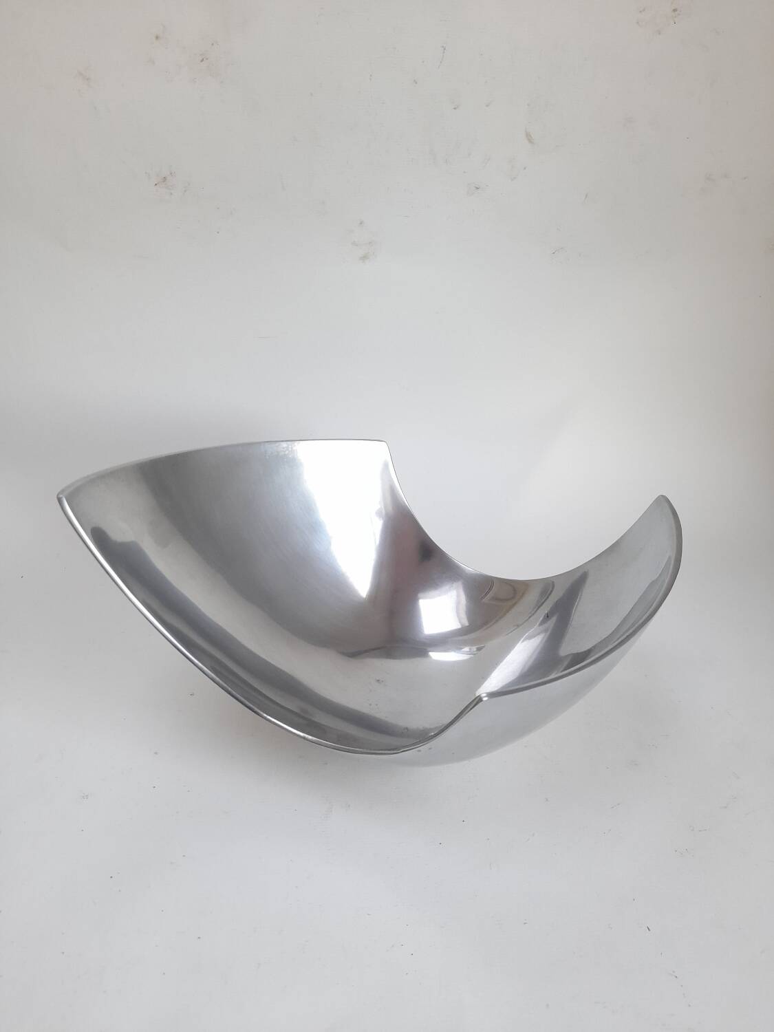 Asymmetrical aluminium fruit dish from the 90s.