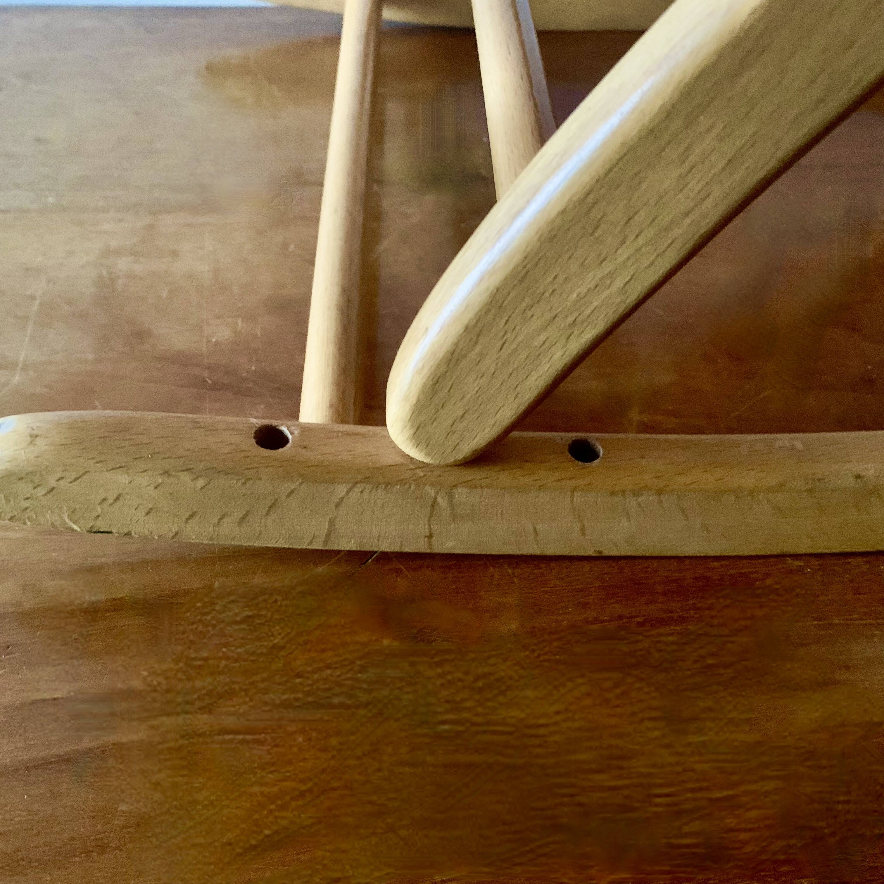 Vintage rocking footstool in red Skai and wood