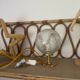 Small handcrafted globe lamp with a cracked finish and a golden brass base.