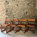 Suite de 4 chaises en pin par André Sornay