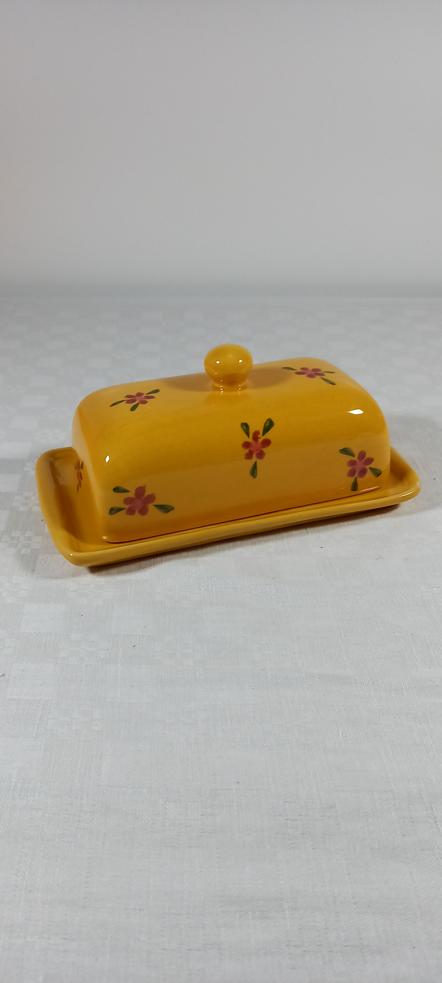 Glazed and decorated ceramic butter dish