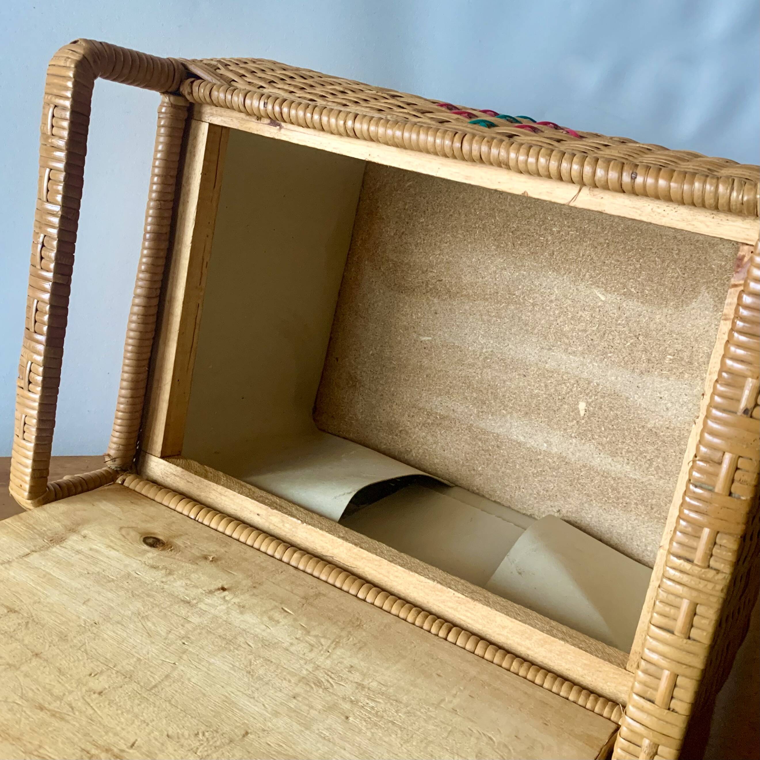 Large vintage rattan and wicker sewing basket with floral decor seat