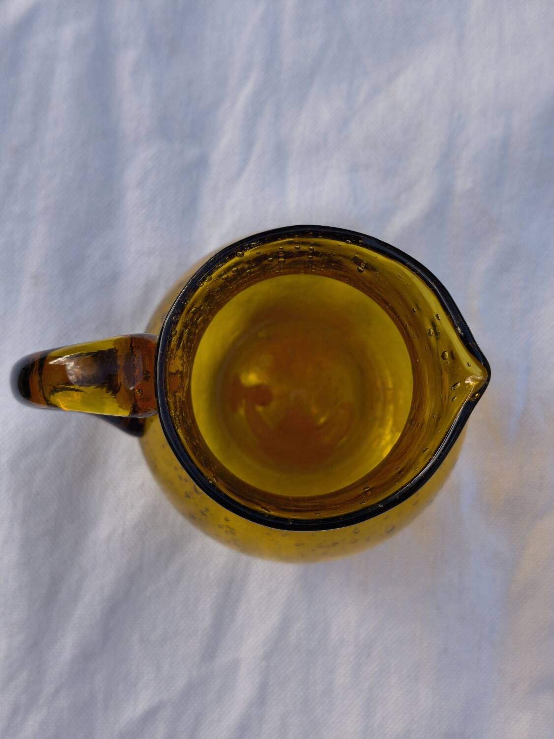 Hand-blown glass pitcher