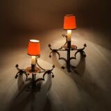 Pair of gilded metal sconces decorated with clovers.