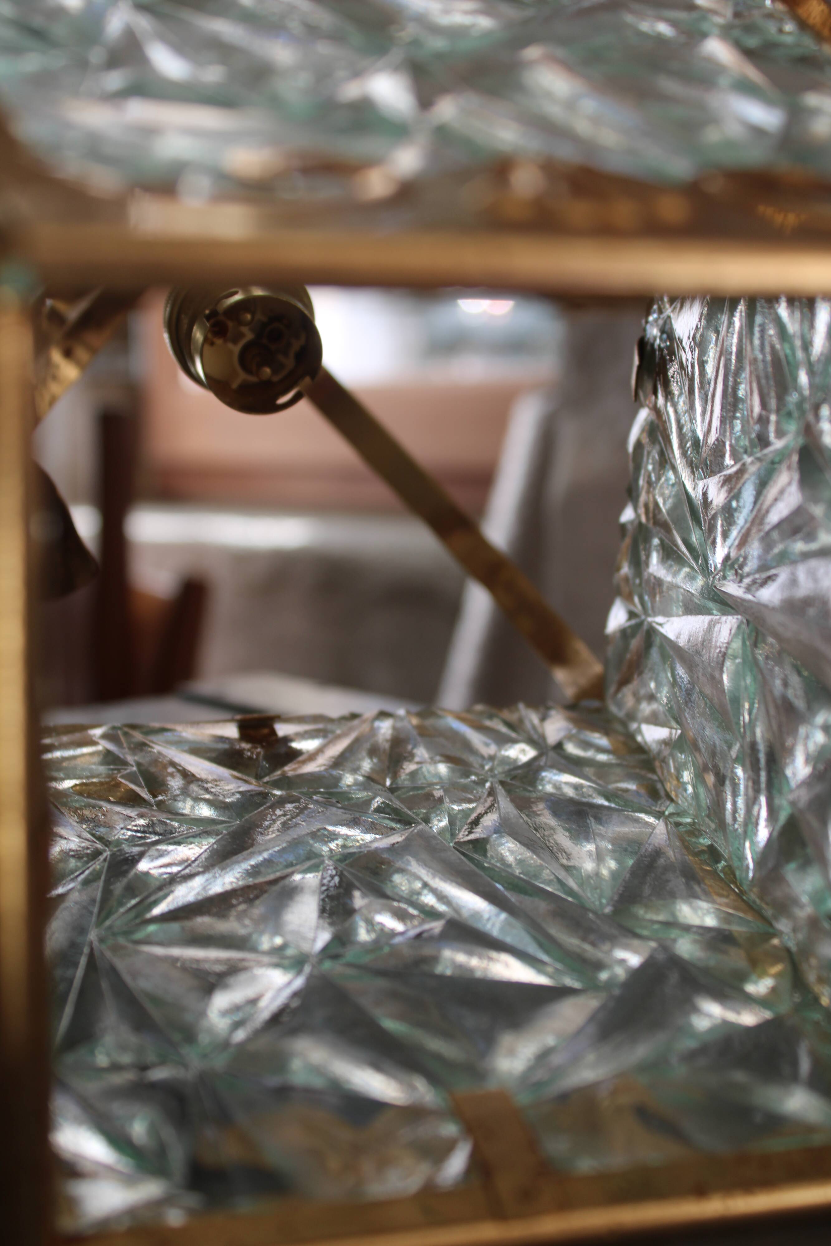 Glass and brass suspension