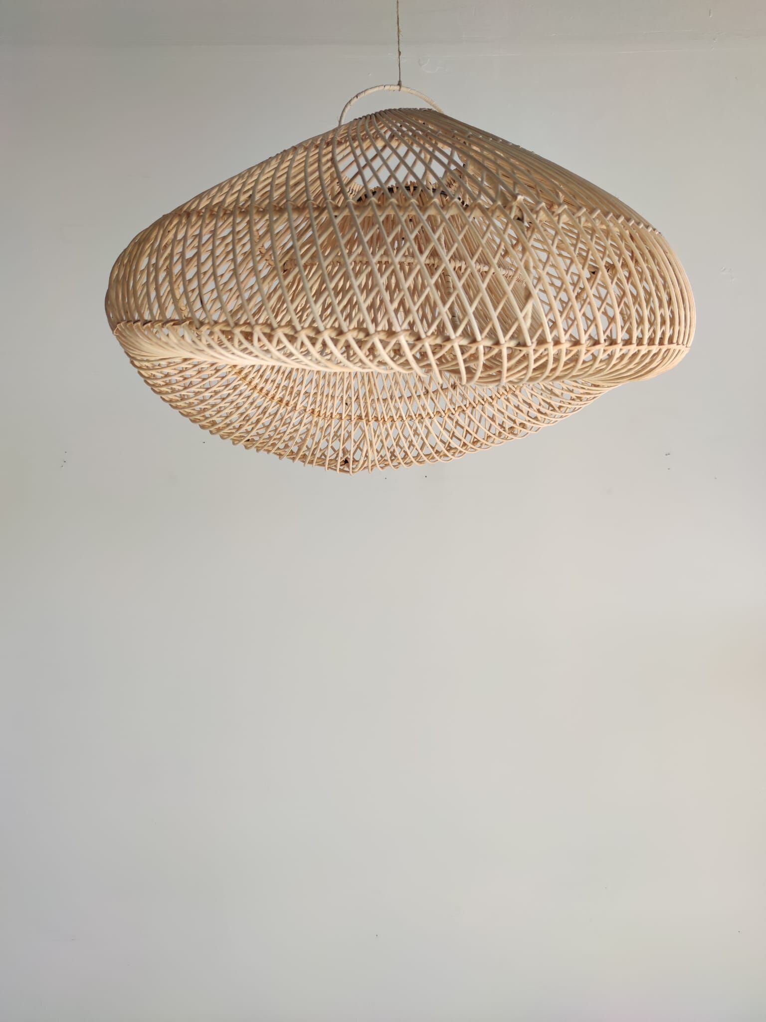 Small rattan lampshade in the shape of a braided hat