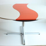 Ying-Yang round orange extendable dining table, 1970s.