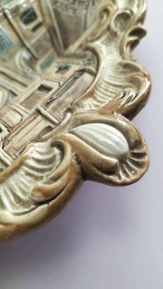 Polychrome slip wall plaque signed WS&S Rouen